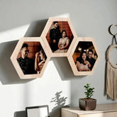 Personalized Wedding Wall Frames featuring three hexagonal wood frames with couple photos, perfect for romantic anniversary or wedding gifts.